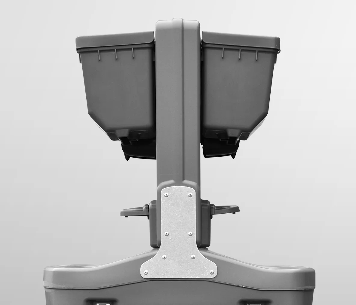 Back view of a gray double-basin commercial handwashing sink station with faucets and basins.