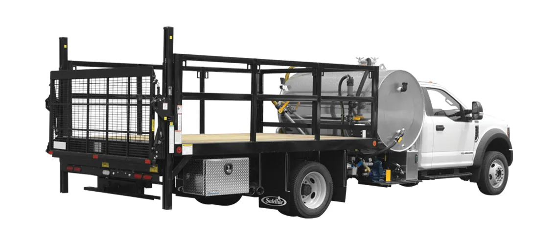 White work truck with flatbed, metal cage gate, and large cylindrical tank on the back.