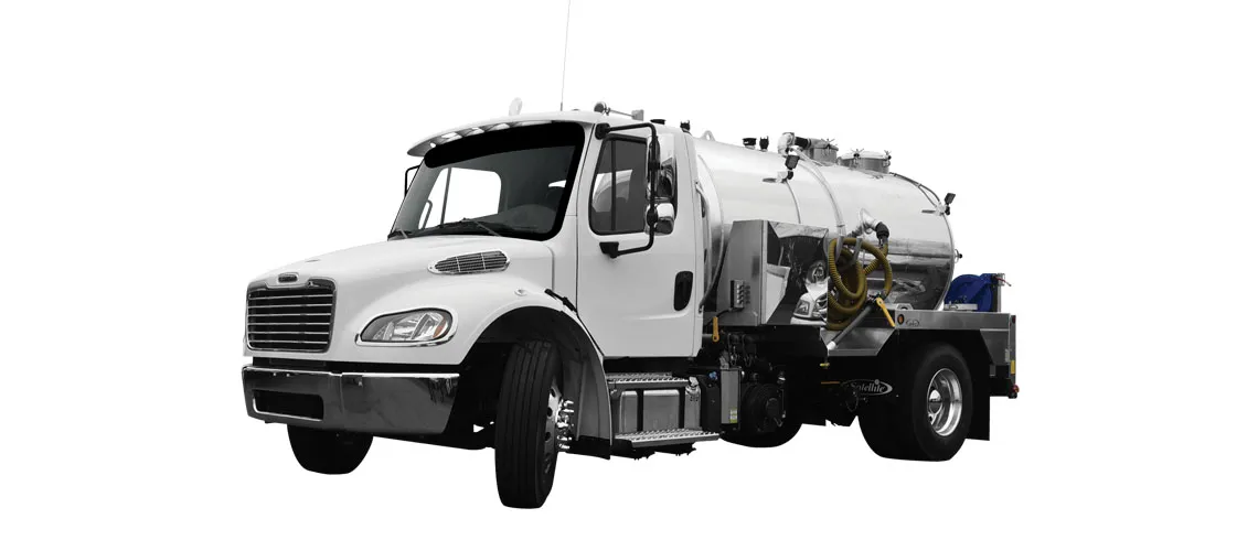 White vacuum truck with a cylindrical tank and rear-mounted equipment on a flatbed.