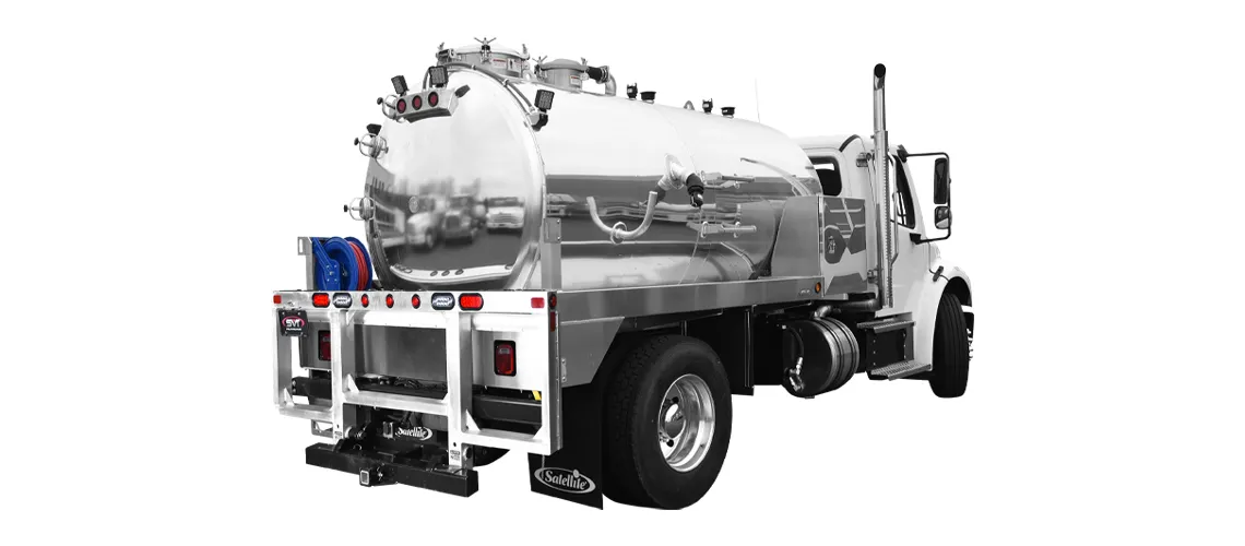 Rear side view of a white tanker truck with a shiny cylindrical tank and hose reel on a white background.