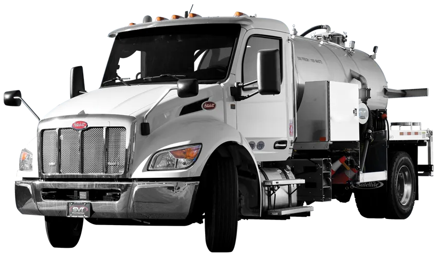 A silver tanker truck with a polished front and side compartments for liquid transport.
