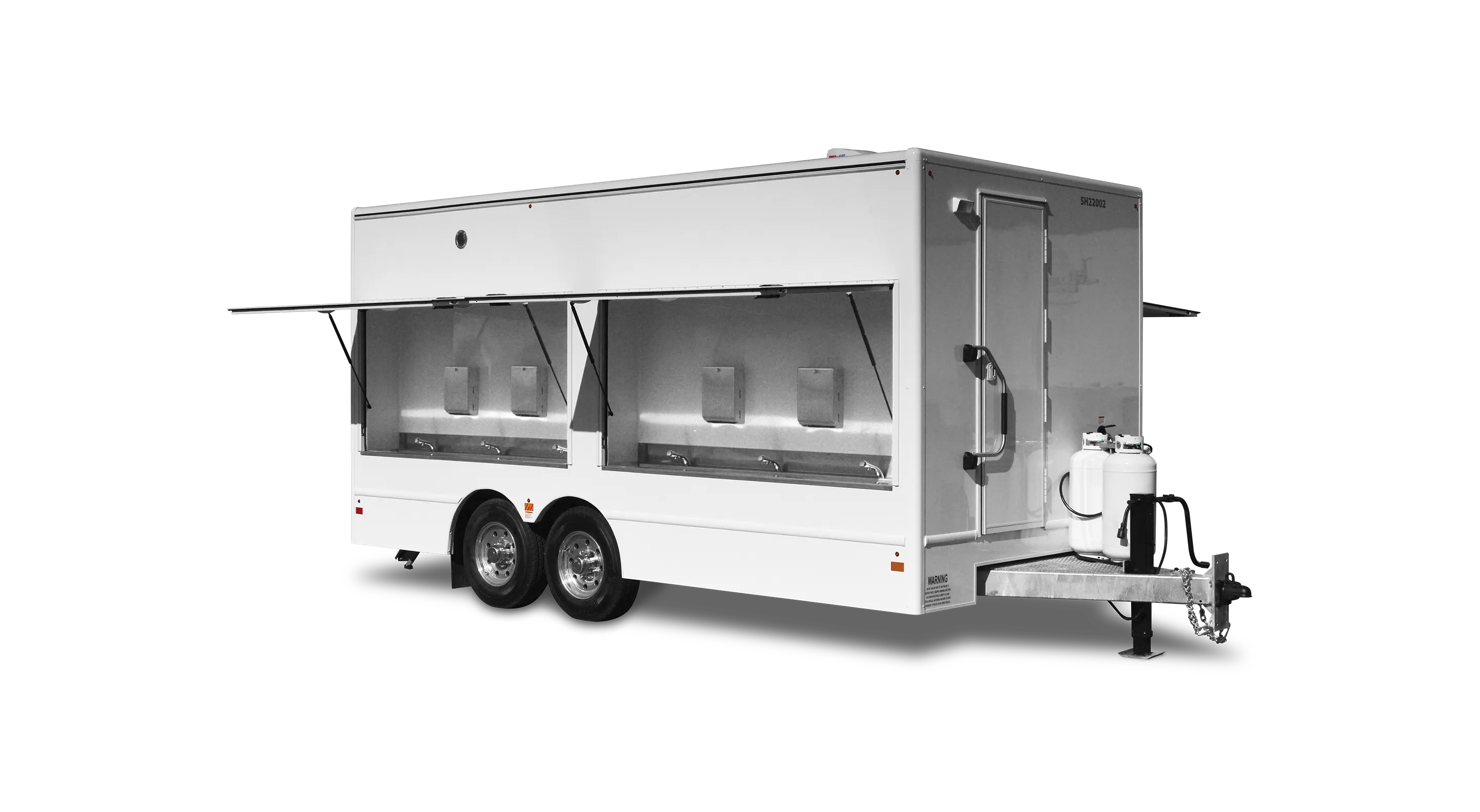 Mobile sink trailer with six dual stations and stainless steel sinks, designed for outdoor events.